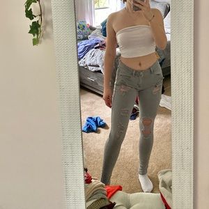grey ripped jeans